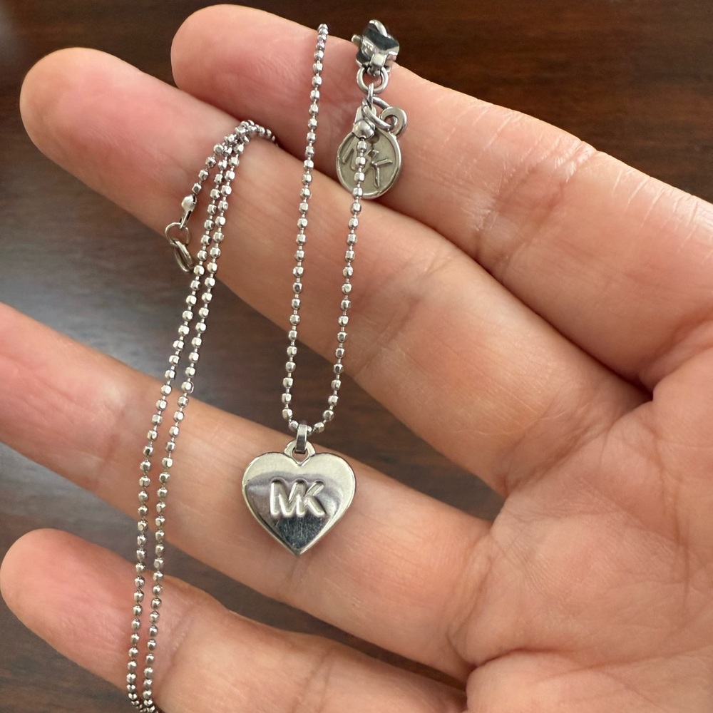 Michael Kors silver tone heart pendant and adjustable chain